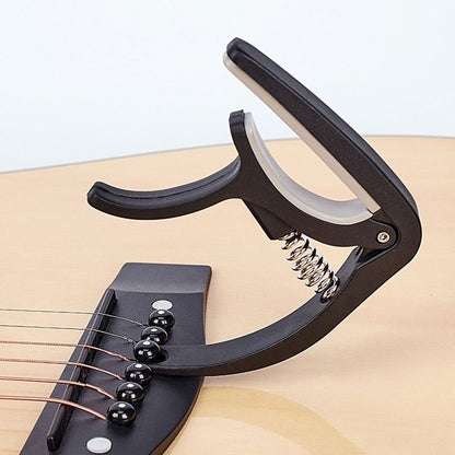 Independent plastic sound-shielding guitar pick-up ¨C dual-purpose classical guitar clamp, guitar accessory