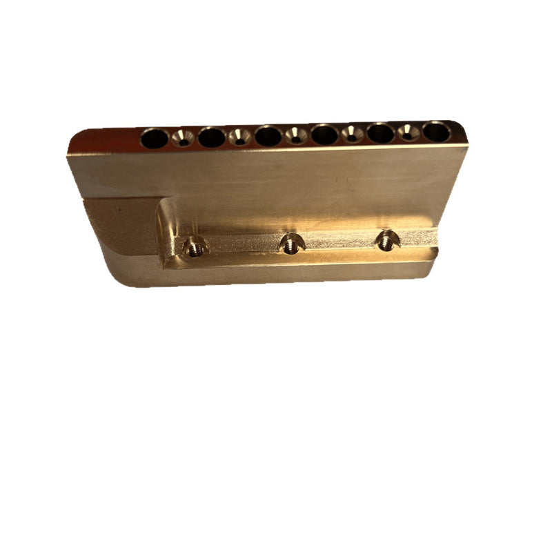 Electric guitar with single-pivot bridge; brass base; electric guitar with copper base; vibrato system; bridge vibrato system